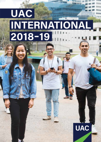 Cover of the publication UAC International 2018-19 which depicts a small crowd of young people standing outdoors smiling to camera Cover of the publication UAC International 2018-19 which depicts a small crowd of young people standing outdoors smiling to camera