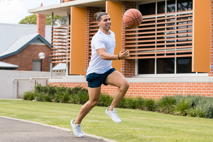 Young man playing basketball